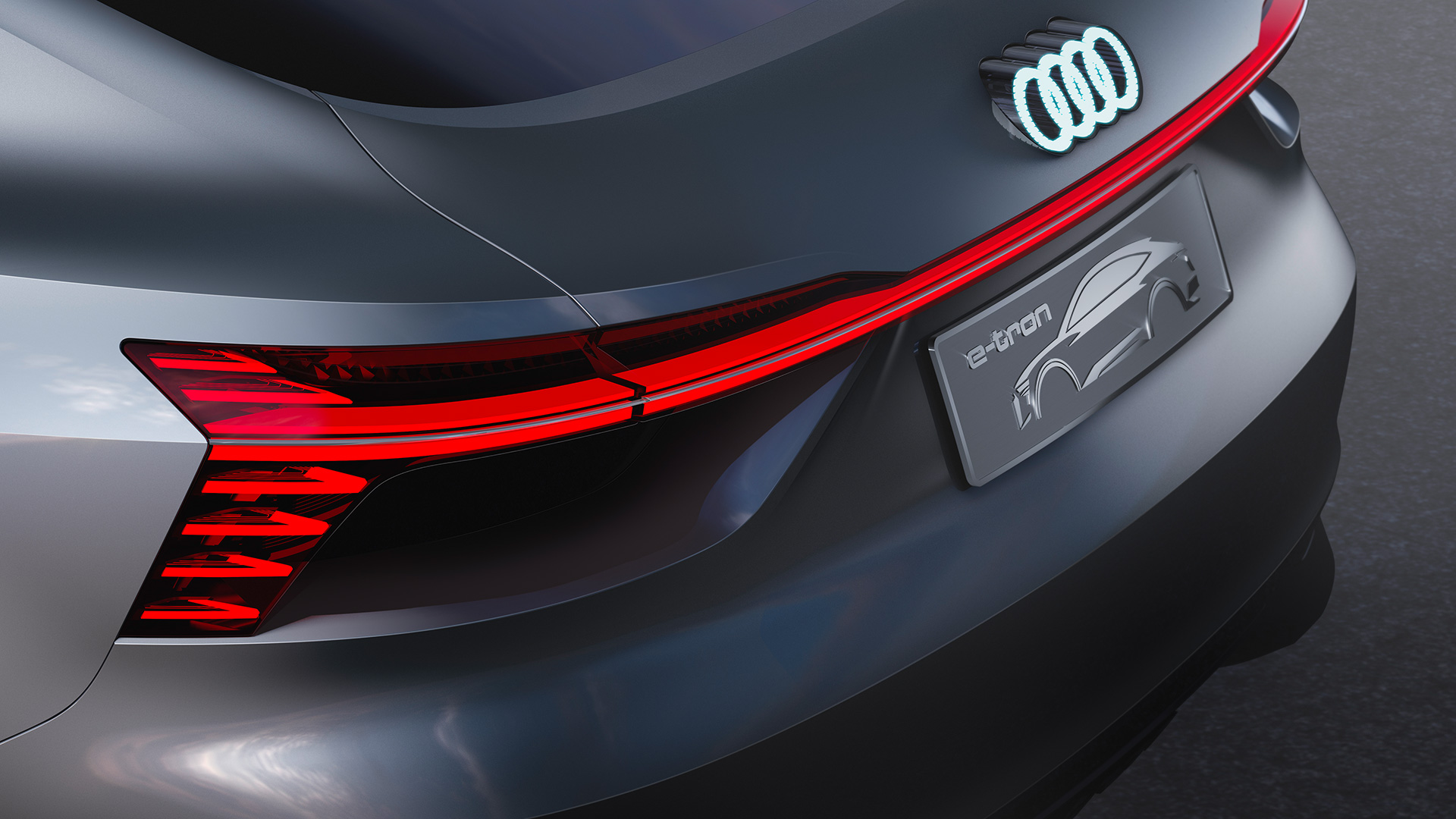 2020 Audi E-Tron Sportback red arc of light back side car view 4k photo