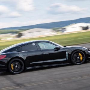 Porsche Taycan 2020 black color side view speed miles 0-200 on road 4k uhd wallpaper