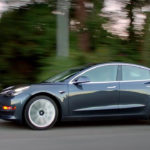 Tesla Model 3 on road